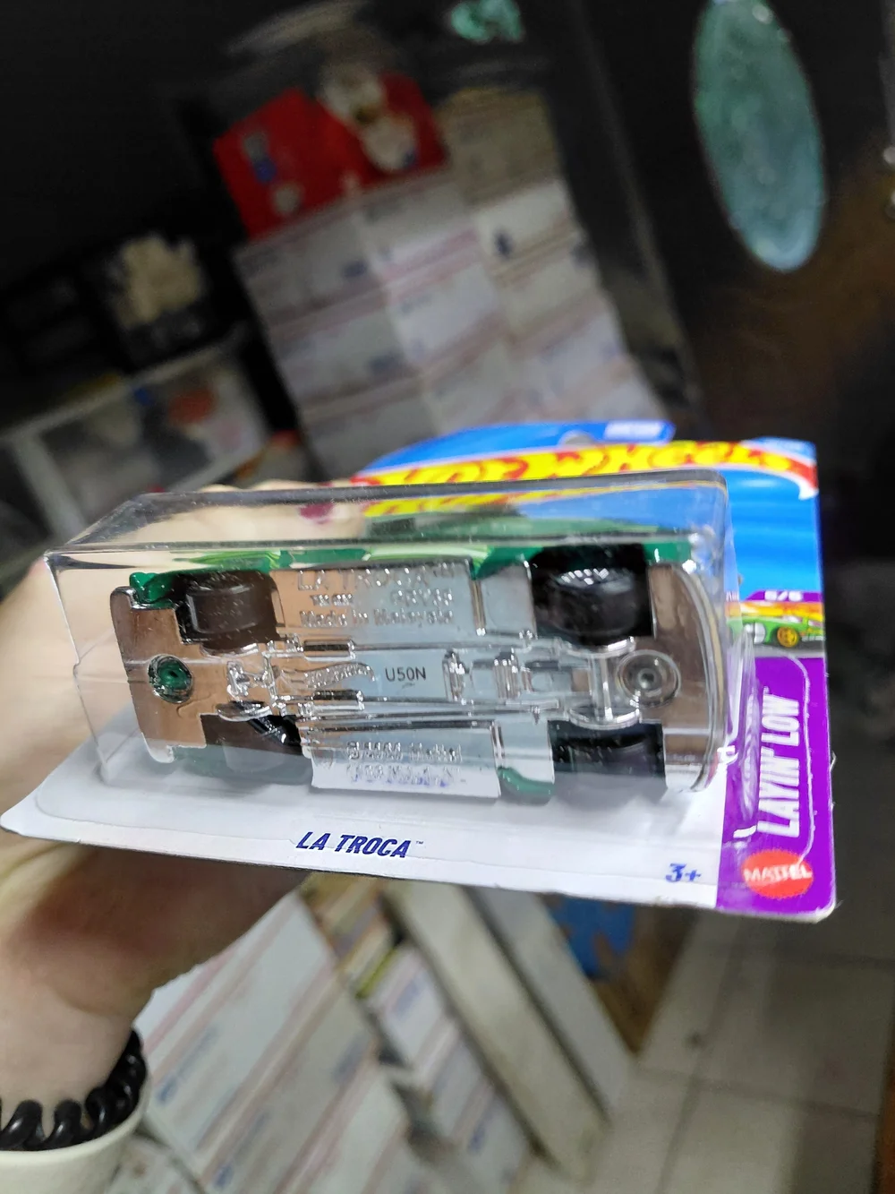 green Hot Wheels La Troca is a 1:64 scale die-cast lowrider pickup truck from th